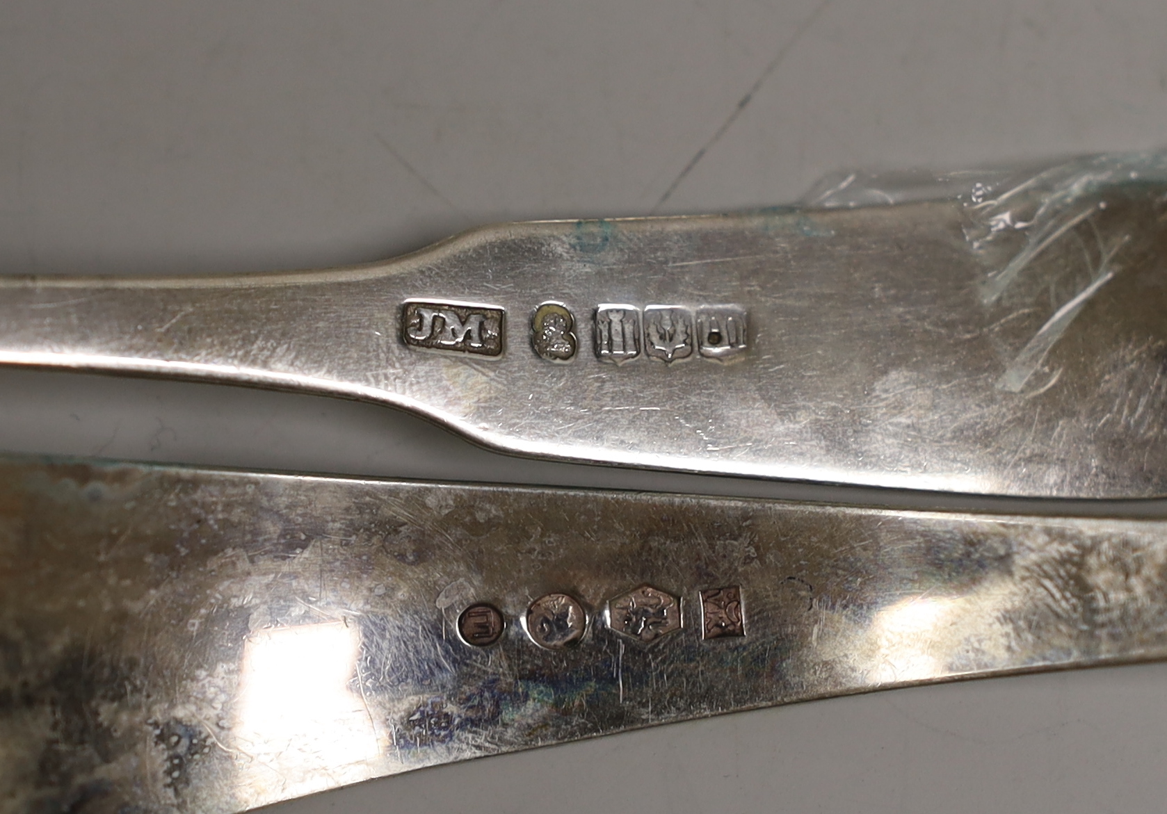 A small selection of Georgian and later silver to include six small ladles, including Dutch white metal and a pair of George III Old English pattern silver table spoons, London, 1788, 10.4oz.
